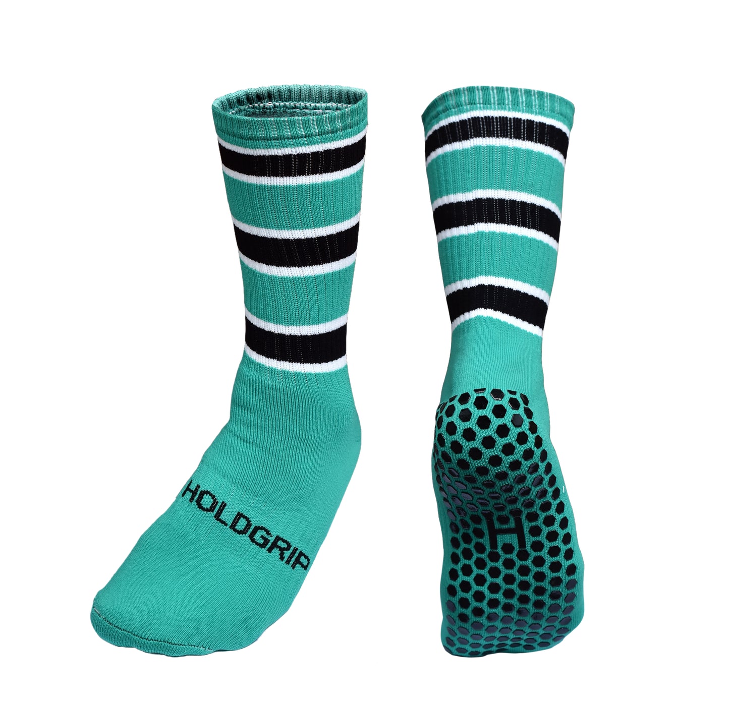 Green socks with black and white stripes and grip sole on a white background