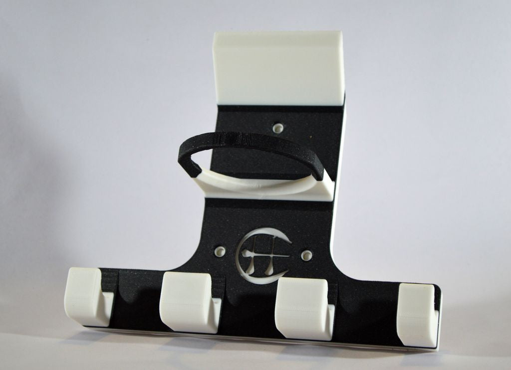 Blavk and white triple hurling holder on white background