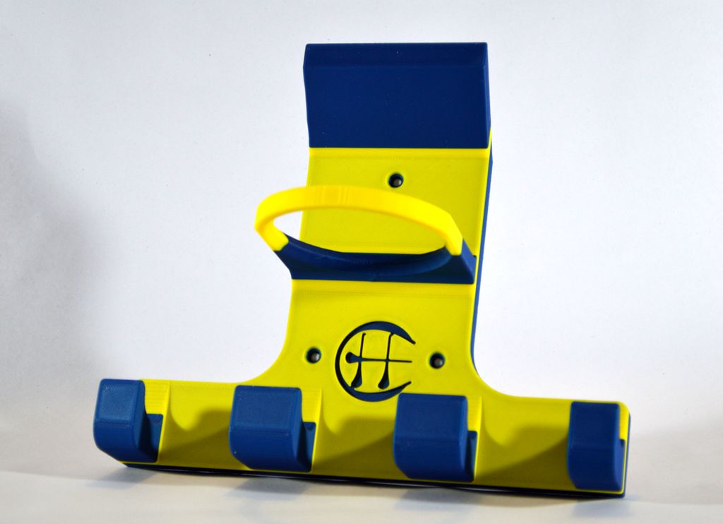 A blue and yellow triple trinity hurley holder designed to hold equipment for the sport of hurling, featuring hooks for a helmet, sliotar, and multiple hurleys.