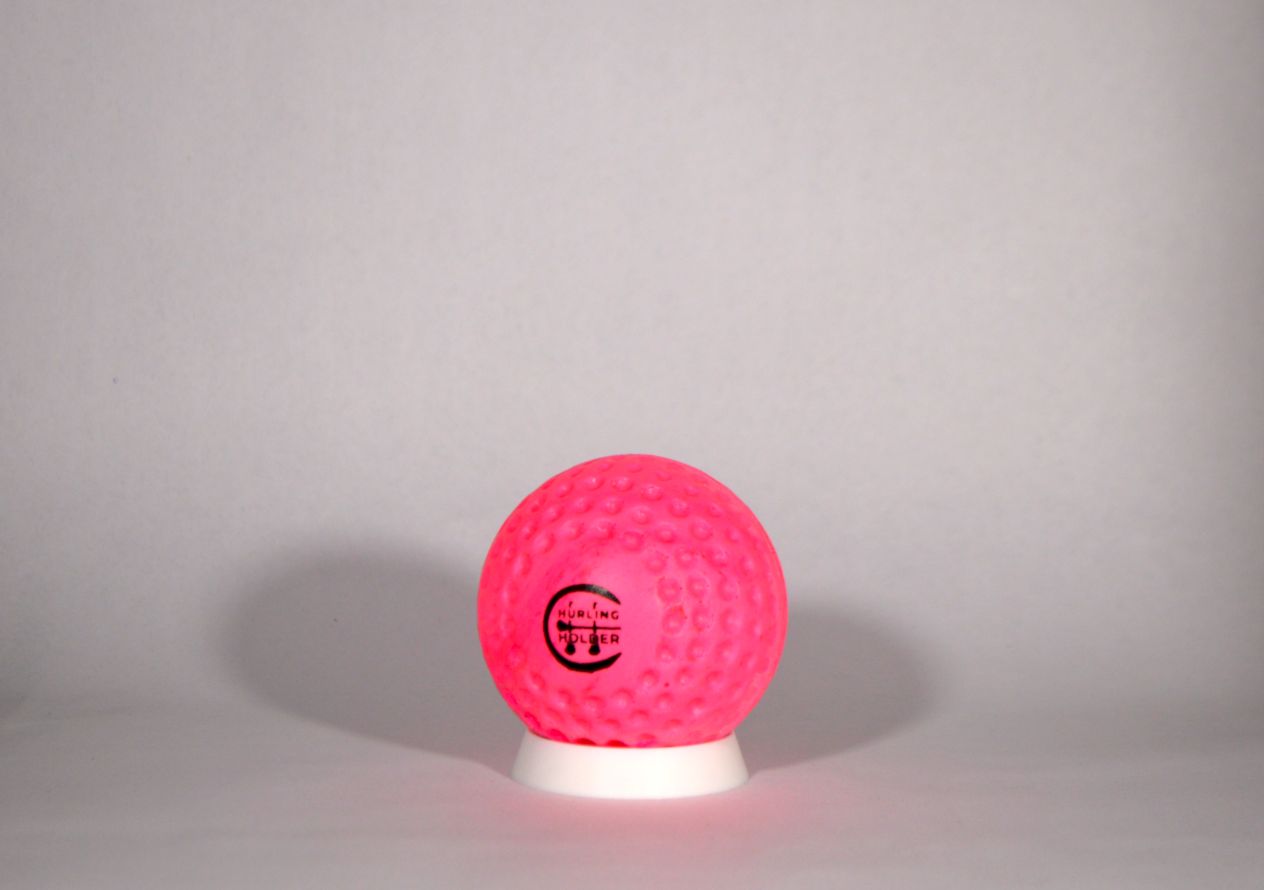 a hurling camogie fireball in pink colour wit ha white background
